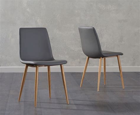 Dining chairs don't just have to look good, but should feel good, too. Bern Grey Faux Leather Dining Chair With Wooden Legs ...
