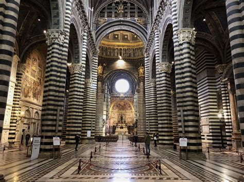 The Striped Marble Columns Of Siena Cathedral Create A Striking