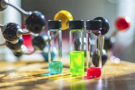 Chemical Test Solutions In Different Vials Under The Light With