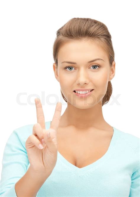 bright picture of lovely teenage girl showing victory sign stock image colourbox
