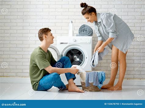 Loving Couple Is Doing Laundry Stock Image Image Of Caucasian