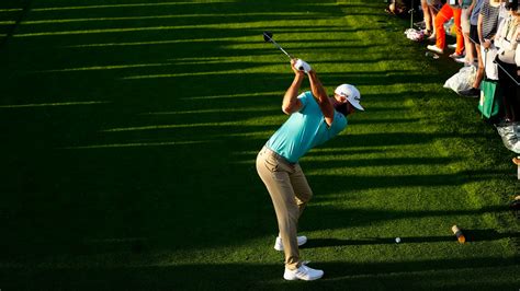 Masters Champion Dustin Johnson Plays From The No 18 Tee During The