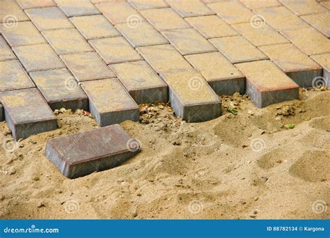 Paving Slabs On A Bed Of Sand Stock Photo Image Of Municipal Yellow