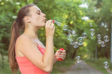 Young Woman Blowing Bubbles Stock Image Image Of Life Happiness