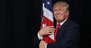 Image result for trump hug flag pics