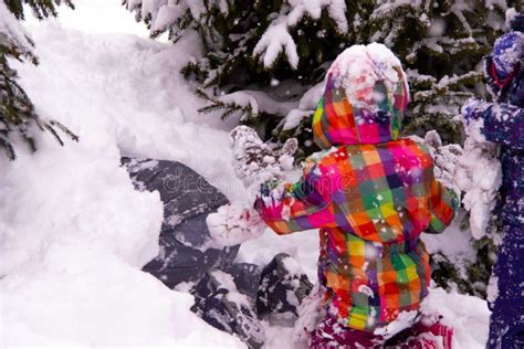 Children Play In The Snow After Heavy Snow Mountains Of Snow Stock