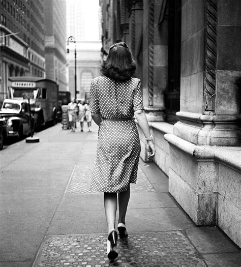 A Woman Walks Down The Sidewalks Of New York City In A Polka Dot Dress 1946 Vintage 1940s