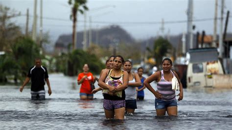 hurricane maria aftermath puerto rico evacuates 70 000 after dam fails