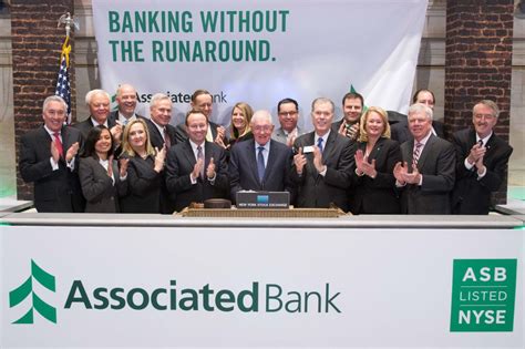 Associated Bank Knocks Down Notion Of Banking Barriers Celebrates