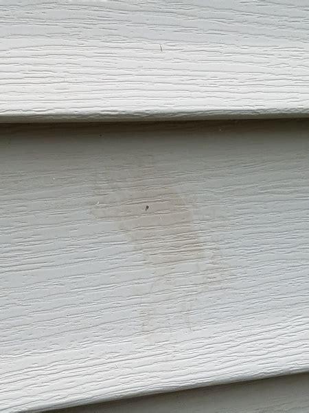 Blotchy Stains Vinyl Siding After Power Washing Deck Roofingsiding