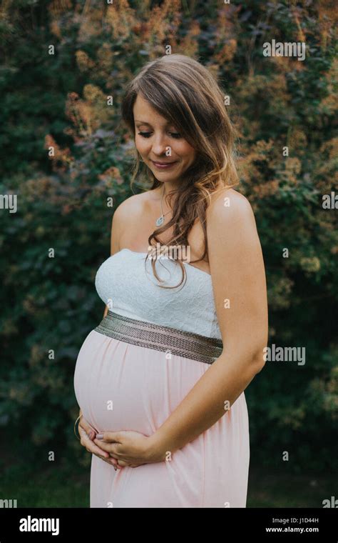 Soon To Be Mom Shows Her Belly Stock Photo Alamy