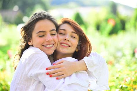 Two Women Friends Laughing And Hugging Outdoors Girls Love Stock Image Image Of Embracing
