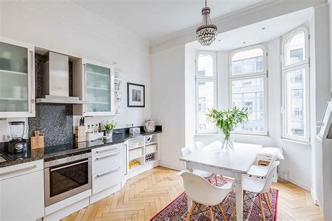 It emphasizes clean lines, utility, and simple furnishings that are functional, beautiful, and cozy. White-Scandinavian-kitchen-with-a-flood-of-natural-light-and-herringbone-floor White ...