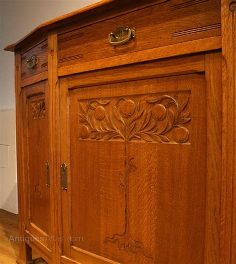 This is a wonderfully stylish example of an arts and crafts sideboard in solid oak. An Arts & Crafts Carved Oak Sideboard - Antiques Atlas