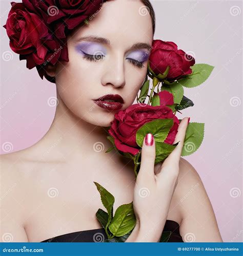 Beautiful Girl With Red Roses Flower Stock Photo Image Of Brunette