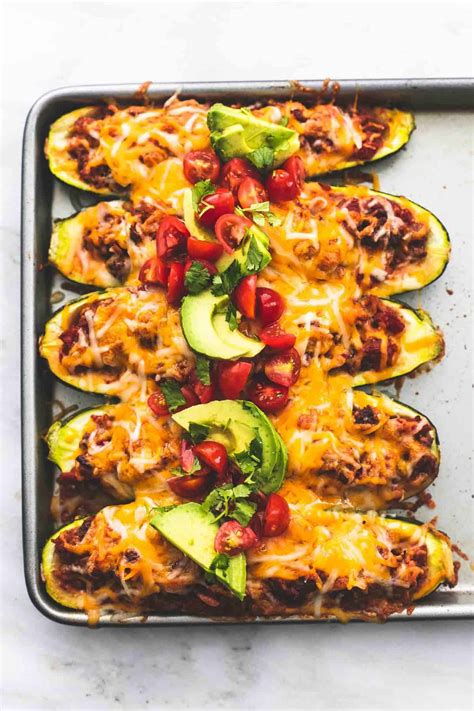 This post may contain affiliate links. Easy Taco Stuffed Zucchini Boats | Creme De La Crumb
