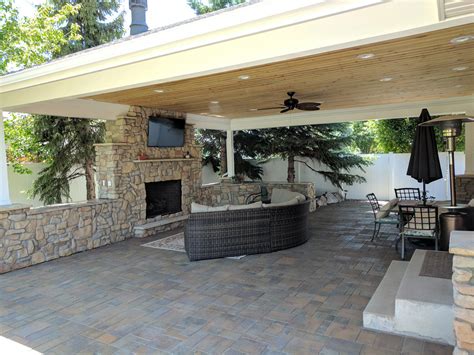 Ogden Covered Patio With Fireplace And Tv Makes Backyard