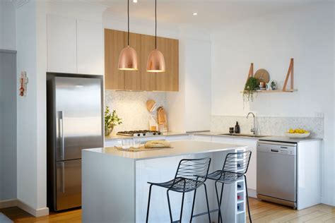 In this small kitchen interior design, some portion of a venture by architect babi teixeira, white prevails; A clean palette: small kitchen design - Completehome
