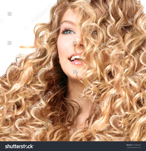 Beauty Girl With Blonde Curly Hair Healthy And Long Permed Blond Wavy Hair Beautiful Smiling