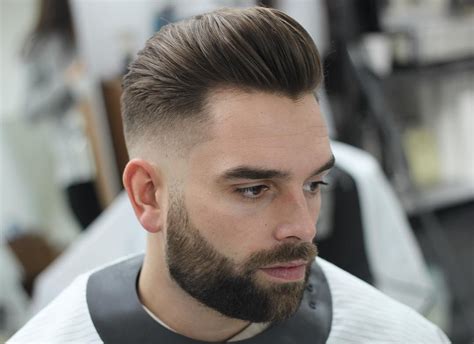 This minimalist look places more emphasis on your wardrobe and sharp business haircuts are usually shorter, but this is a great example of how a professional cut can be on the longer side. Men's Hair Styles and Trends for 2019 | Dapper Confidential