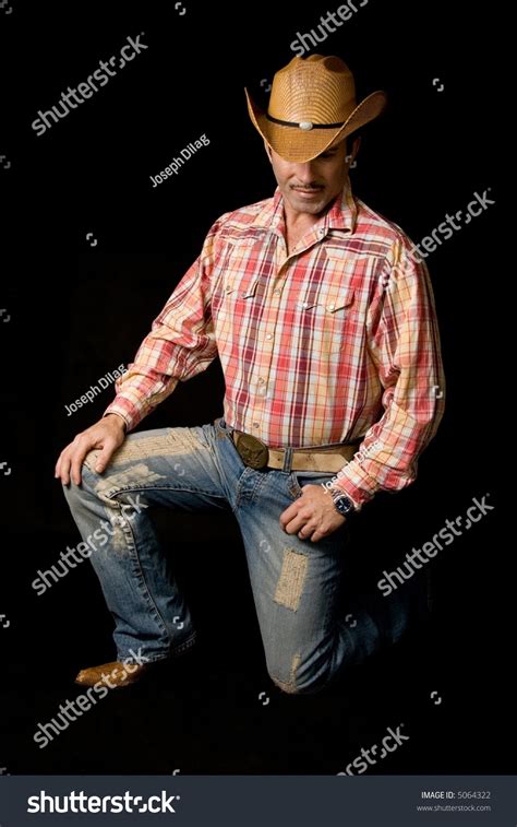 Cowboy Kneeling Stock Photo 5064322 Shutterstock