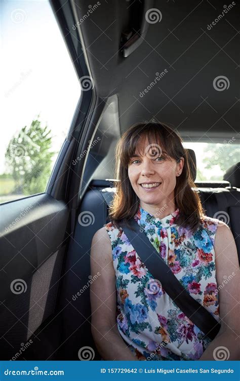 Woman Sitting In The Backseat Of A Car Stock Photo Image Of Vehicle