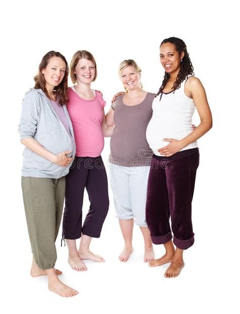 bonded by the joy of impending motherhood pregnant friends standing together while isolated on