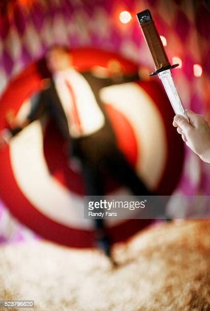 Circus Knife Throwing Photos And Premium High Res Pictures Getty Images