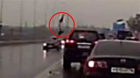 Shocking Footage Shows Woman Survive Horrific Car Crash Despite Being