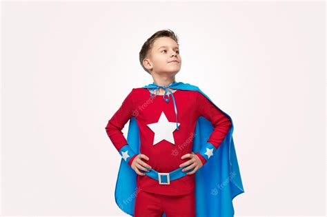 Premium Photo Brave Superhero Boy In Costume In Studio