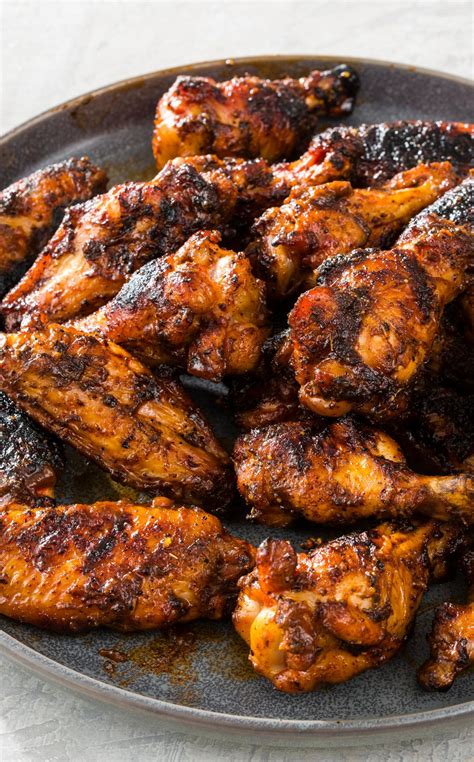 You can also grill these chicken wings on a gas or charcoal grill over moderate heat for 15 to 20 minutes, turning frequently. Smoked Chicken Wings: A quick brine, a barbecue-inspired spice rub, and a two-level fire on a ...