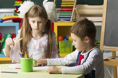 Preschoolers Draw And Engage In School Stock Photo Image Of Classroom