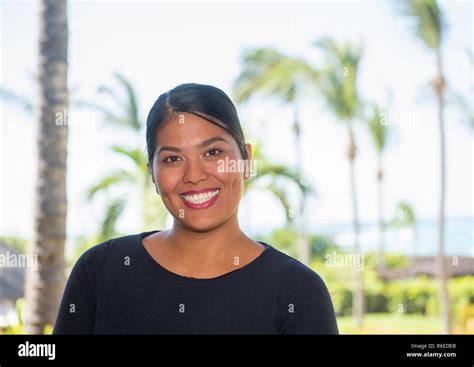 Happy Smiling Friendly And Beautiful Mexican Woman Working In A Resort