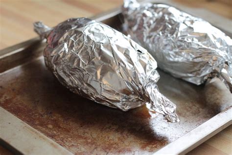 Step 2 place the potato in the preheated oven, and bake for 90 minutes, or until slightly soft and golden brown. How to Cook Sweet Potatoes in Aluminum Foil in the Oven ...