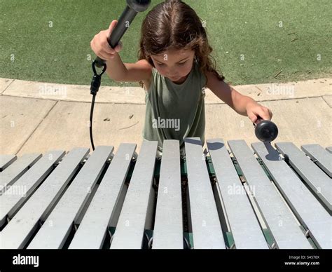 Little Girl Playing Outdoor Xylophone Stock Photo Alamy