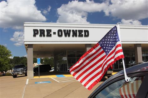 What is a buy here, pay here dealership?