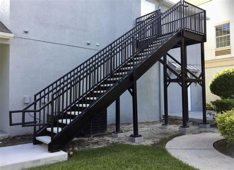 Crossed stairs, perpendicular to the façade; Steel Stairways, Stairs & Railings | Florida Fabrications