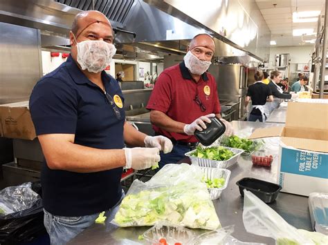 Fighting hunger and feeding hope. San Antonio employees volunteer at local food bank ...