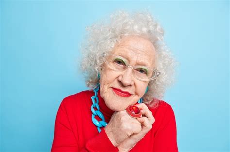 Premium Photo Portrait Of Good Looking Senior Woman Wears Spectacles