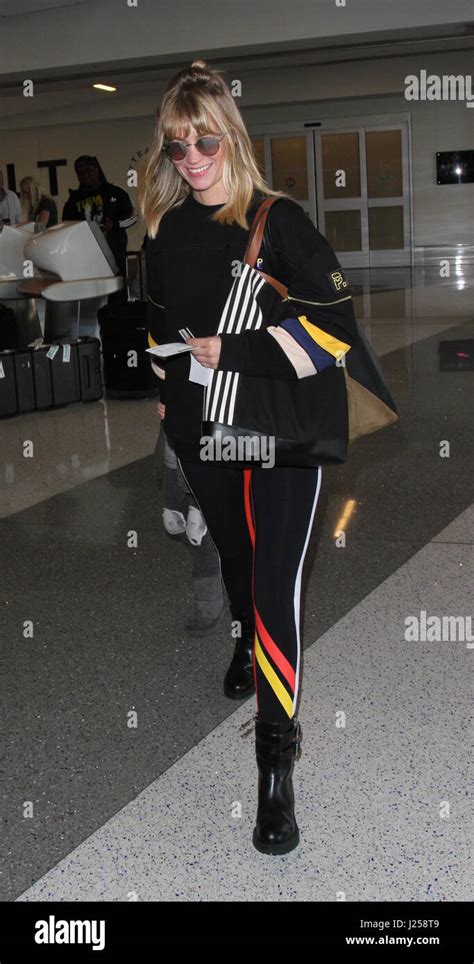 January Jones Departs From The Airport With Her Son Xander Dane Jones