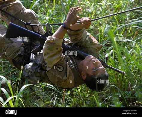 A Us Army Soldier With The 25th Infantry Division Completes A