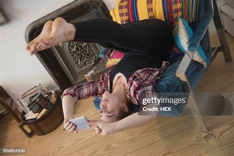 Woman Upside Down Chair Photos And Premium High Res Pictures Getty Images