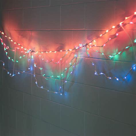 multicolored bulb  white cord swag style string lights