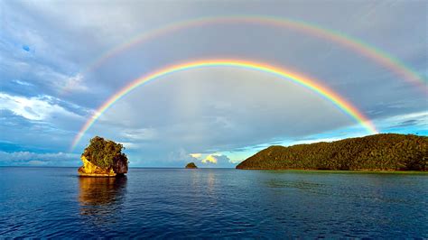 This is a long, varied itinerary full of unique experiences, mixing superb wildlife and colourful culture in an unbeatable combination. Double rainbow at Misool island, West Papua, New Guinea ...