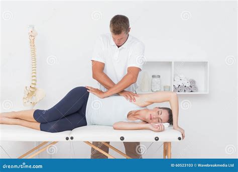 Doctor Examining His Patient Pelvis Royalty Free Stock Photography