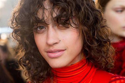 Messy waves, curly shags, sleek blowouts, high ponytails, you. Curly Hair Bangs: 9 Trendy Hairstyle Ideas and Styling Tips