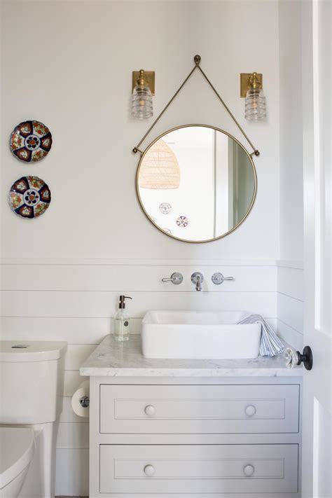Modern White Cottage Bathroom With Antique Details And