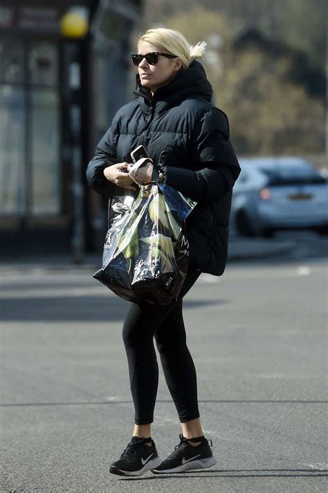 ‍♀️brand ambassador for marks & spencer and garnier. holly willoughby sports a puffer jacket and leggings as ...