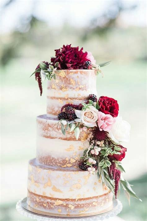 Semi Naked Wedding Cake With Gold Leaf And Flowers