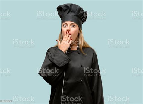 Young Cook Woman Covers Mouth In Shock Looks Shy Expressing Silence And